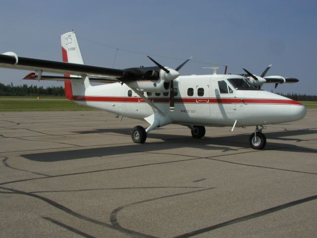 De Havilland Canada Twin Otter (C-FCSX) - Transport Canada Twin Otter parked at Fort Simpson airport. Summer 2004.