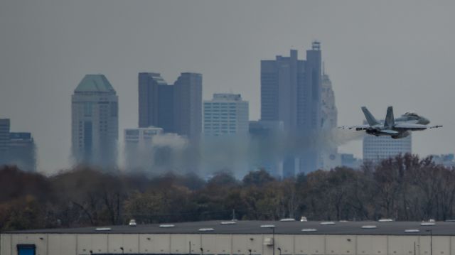 McDonnell Douglas FA-18 Hornet (16-6980) - VAMPIRE41 from VX-9 "Vampires" departing CMH with downtown Columbus in the background.