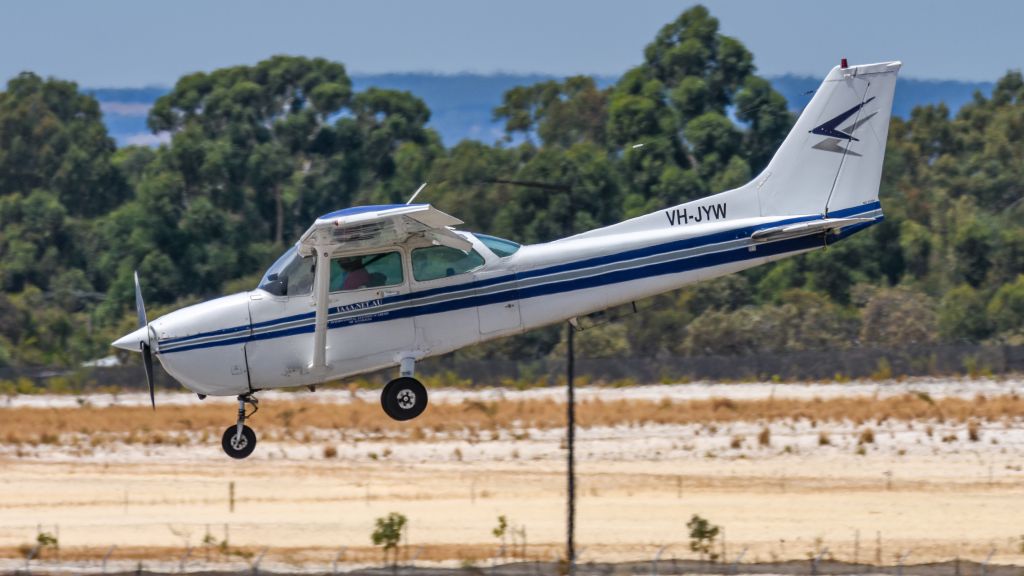 Cessna Skyhawk (VH-JYW) - A very "nose down" approach to the runway! This aircraft appeared to doing a go-around due to the aircraft on takeoff roll taking too long, but all of a sudden it made a dive for the touchdown point. 