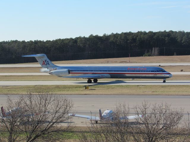 McDonnell Douglas MD-82 (N426AA) - American Airlines flight 1052 to Dallas-Ft Worth Intl, a McDonnell Douglas MD-82 taxiing to takeoff on runway 23R. This was taken January 30, 2016 at 3:53 PM.