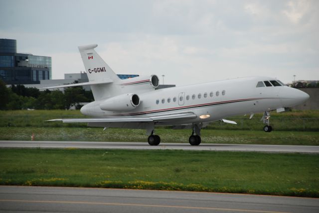 Dassault Falcon 900 (C-GGMI) - Arriving at Buttonville, is local Toronto Billionaire Frank Stronach of Magna International. This Falcon 900EX is 1/3 of his jet fleet, a Falcon 50, and a Citation 560XL for those short hops!!!