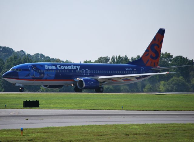 Boeing 737-800 (N813SY) - INTERNATIONAL LEASE FINANCE CORP (Sun Country - NASCAR flight) on takeoff roll, runway 2 at KJQF - 8/16/12