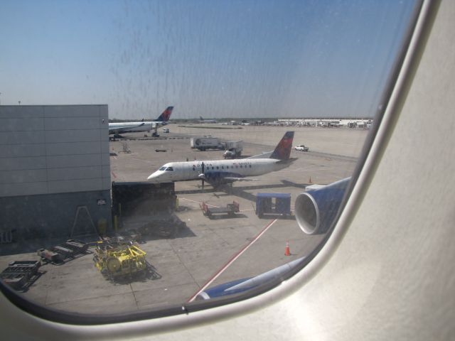 Saab 340 (N448XJ) - Taken from the upper deck of a 747. Showing off how small the thing is.