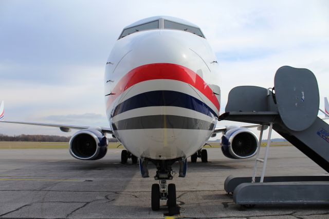 Boeing 737-800 (N917XA) - Nose-on view of a Boeing 737-800 on the ramp at NW Alabama Regional Airport, Muscle Shoals, AL - December 14, 2016. This aircraft transported the University of North Alabama Lion football team to the NCAA Division II Semi-Finals and National Championship game. 