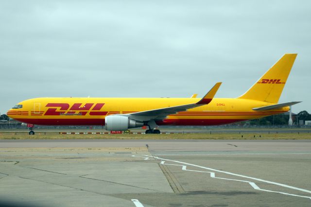 BOEING 767-300 (G-DHLL) - Taxiing to Stand 615 on 18-Jun-22 operating flight DHK558 from OBBI.