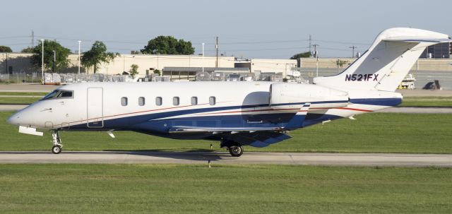 Bombardier Challenger 300 (N521FX) - Taxiing for departure 22