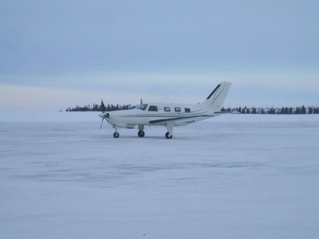 Piper Malibu Mirage (N345BR) - Parked at Woodward Aviation FBO Goose Airport NL.Jan 22/09