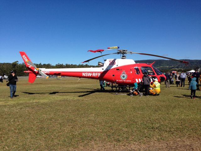 TUSAS Cougar (VH-NFO) - Wings over Illawarra 2014. The helicopter was on display. The NSW Fire Brigade Eurocopter AS350 Firefighter.