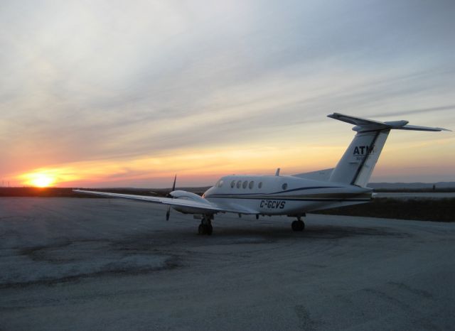 Beechcraft Super King Air 200 (C-GCVS) - C-GCVS, Max Aviation and Atiks Super King Air aiming at the sun - Némiscau (CYHH), October 2011.