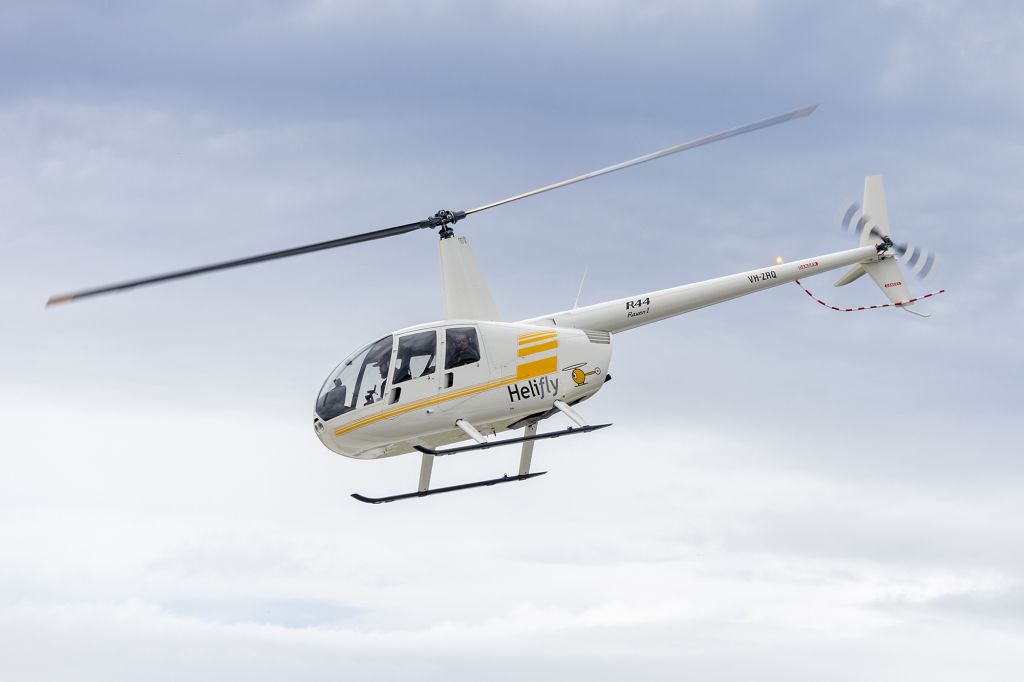 Robinson R-44 (VH-ZRQ) - Helifly (VH-ZRQ) Robinson R44 Raven I departing for a joy flight at Albury Airport.