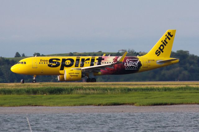 Airbus A320neo (N932NK) - Spirit A320-271N (N932NK) in special 'Spirit Untamed' livery departing Logan early morning on 6/23/21. Plane previously had Country Singer Brett Young special livery.