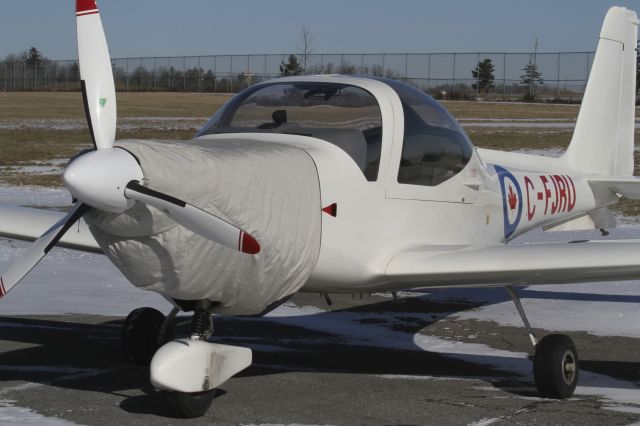 GROB Tutor (C-FJRU) - Grob 115D parked up during a visit to Kingston from Gatineau - Sunday, Jan 27, 2013