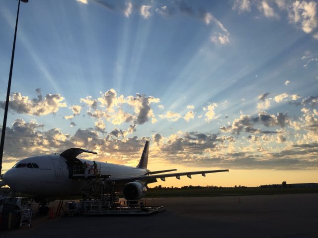 Airbus A300F4-600 (N653FE) - A beautiful August Evening complete with Crepuscular Rays above ATW International.