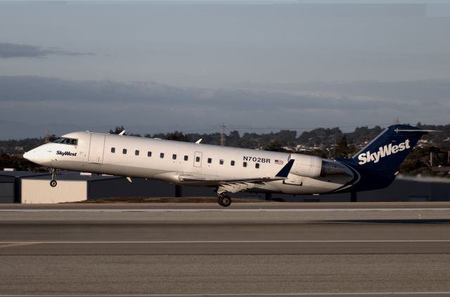 Canadair Regional Jet CRJ-200 (N702BR) - KMRY - Skywest departing for LAX