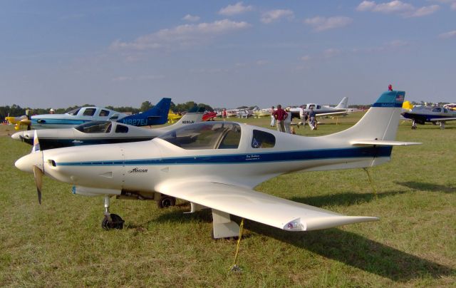 PAI Lancair 320 (N4464D) - This is a 2006 photo of N4464D at Sun N' Fun parked with many other Lancairs. The MACH 3+ patch on the airplane got my attention. Just below the patch was the name "Pat Halloran, Colorado Springs". I spoke to Pat later and he said that had flown down from his home in Colorado at Mach 0.01 !  Pat flew this Lancair from 2006 to 2019 (13 years). 