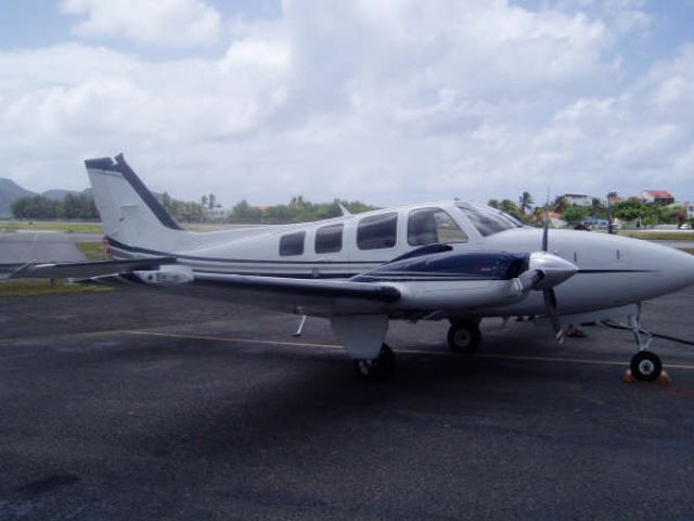 Beechcraft Baron (58) (N67WQ) - Refueling in the Caribbean Islands.