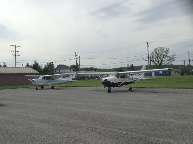 Cessna Skyhawk (N733RR) - both of the YFTA trainers sitting on the north ramp