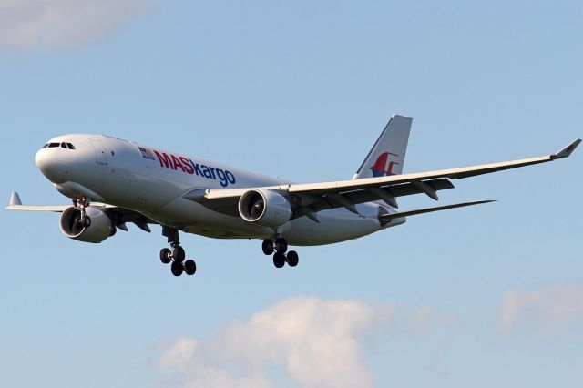 Airbus A330-300 (9M-MUC) - white cargo
