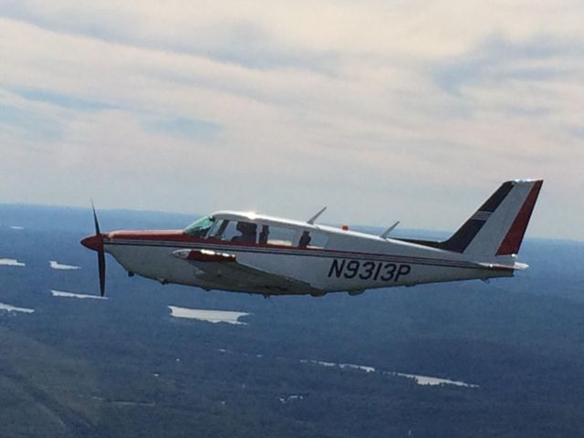 Piper PA-24 Comanche (N9313P) - Over Conn