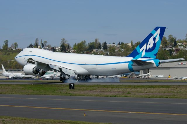 BOEING 747-8 (BOE521) - 747-8F smokes the landing after a certification test flight.