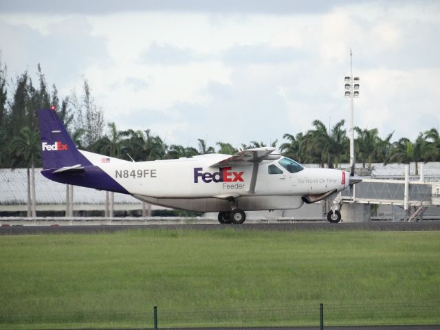 Cessna Caravan (N849FE) - Tail # N849FE br /Departing Pointe-a-Pitre le raizet on november 09, 2017.