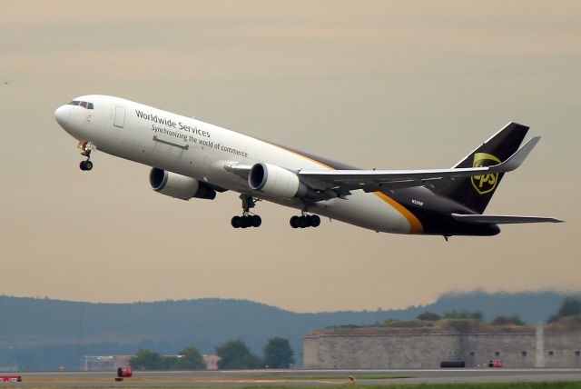 BOEING 767-300 (N329UP) - UPS 2013 departing to Newark on RWY 9
