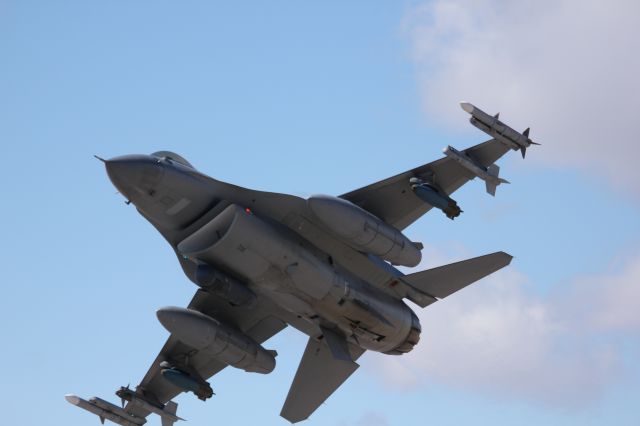 Lockheed F-16 Fighting Falcon — - This F16 from the 140th Colorado National Guard unit at Buckley AFB was departing runway 14 on its way to bombing practice. It was zipping by me in afterburner at 250+ knots, so I found it difficult to get centered shots.