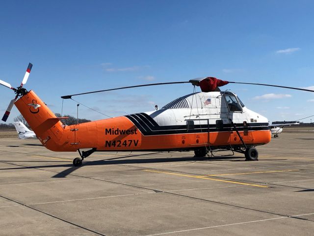 Sikorsky S-58T (N4247V) - Parked on the ramp at Indianapolis Metro - KUMP. Used as an aerial crane for construction projects (e.g. lifting industrial size AC units on commercial facility roofs) 