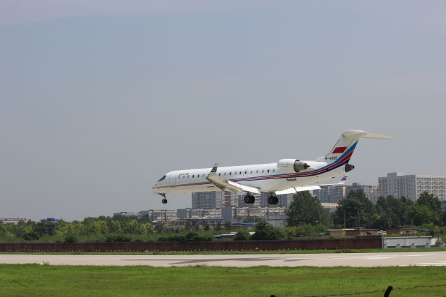 Canadair Regional Jet CRJ-700 (B-4060) - Beijing, XiJiao Airport Plane spottingbr /It's a military airport, but mainly used for transporting officials, so no fighters...