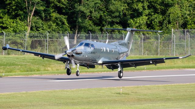 Pilatus PC-12 (N293TW) - N293TW about to touch down on College Park Airport's runway 33 after a flight from Providence 