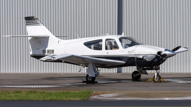 North American Rockwell Turbo Commander (680) (VH-MBM) - Seen here parked up with a damaged wing after wild weather blew the doors off the hangar it was stored in. They fell onto the aircraft causing the damage.