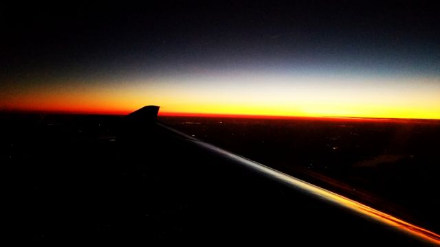 Pilatus PC-12 (N340AF) - Crossing into TX. Sunset from above.  