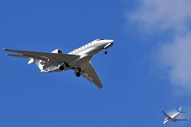 Cessna Citation X (N769XJ) - N769XJ on short final to runway 9L at OPF as WestJet B737-7CT C-FWSI is on downwind for runway 12 at MIA