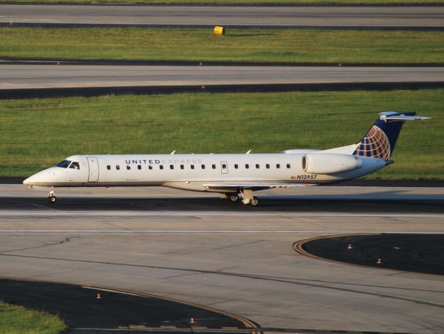 Embraer ERJ-145 (N12957) - Departing at dawn 6/16/12