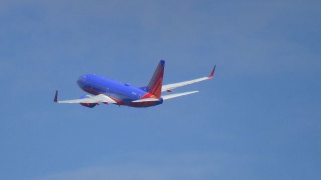 Boeing 737-700 (N733SW) - Departing runway 5R.