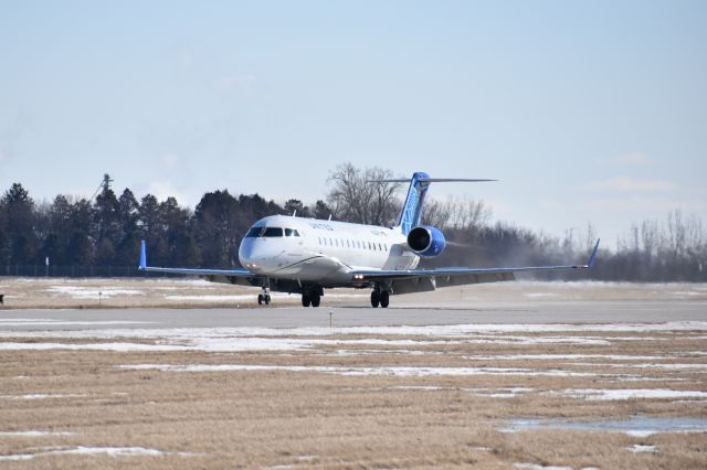 Canadair Regional Jet CRJ-200 (N221PS) - United Express, operated by SkyWest Airlines, first landing at Mason City Municipal Airport March 1, 2021.  