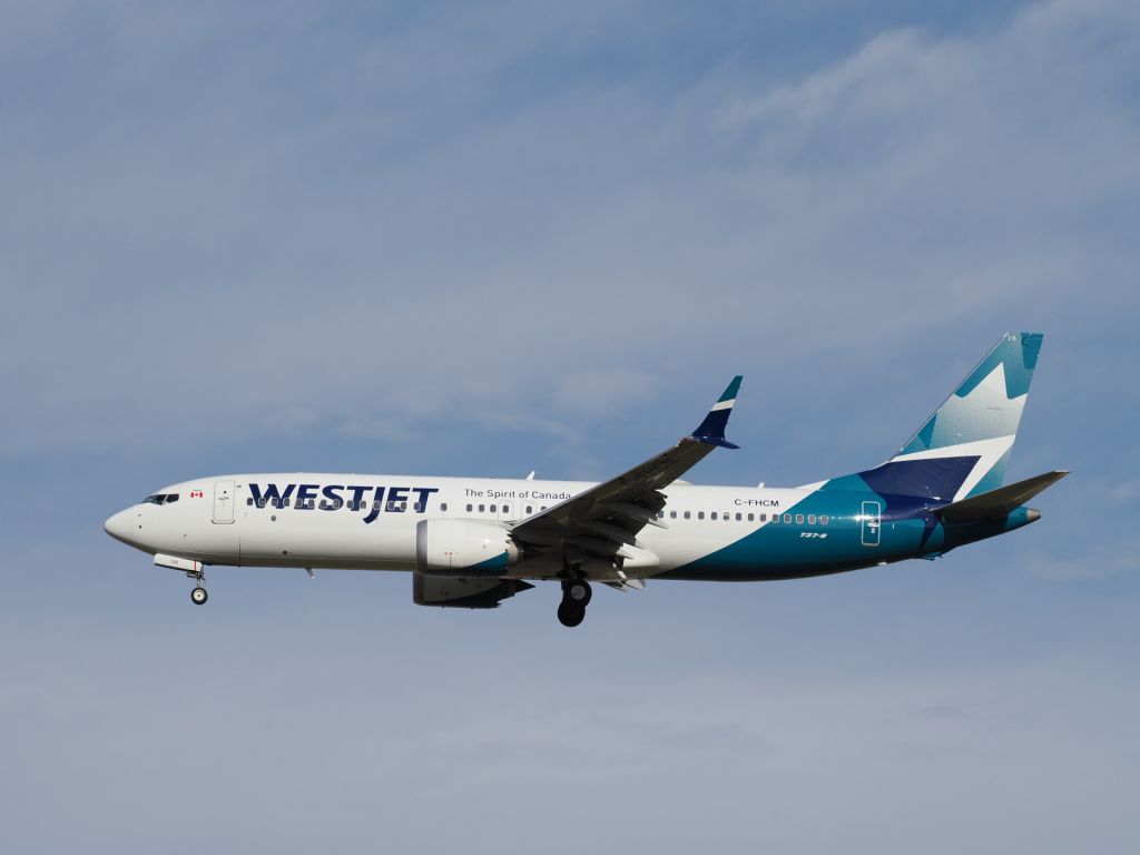 Photo of WJA Boeing 737 MAX (C-FHCM) - FlightAware