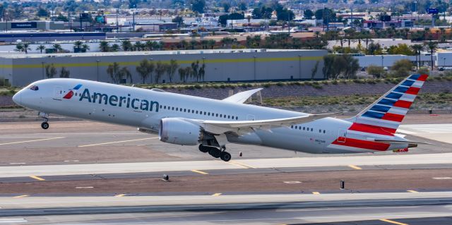 Boeing 787-9 Dreamliner (N823AN) - An American Airlines 787-9 taking off from PHX on 2/13/23, the busiest day in PHX history, during the Super Bowl rush. Taken with a Canon R7 and Canon EF 100-400 II L lens.