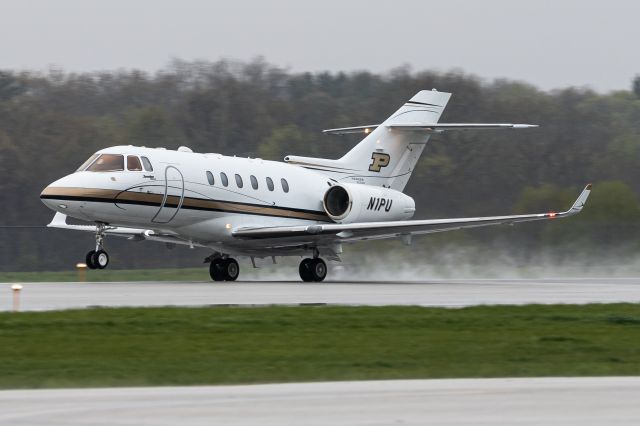 Hawker 800 (N1PU) - Purdue's Hawker 900XP rotating off of 10 in some rainy/snowy conditions in April, bound for a slightly less formidable Tennessee.