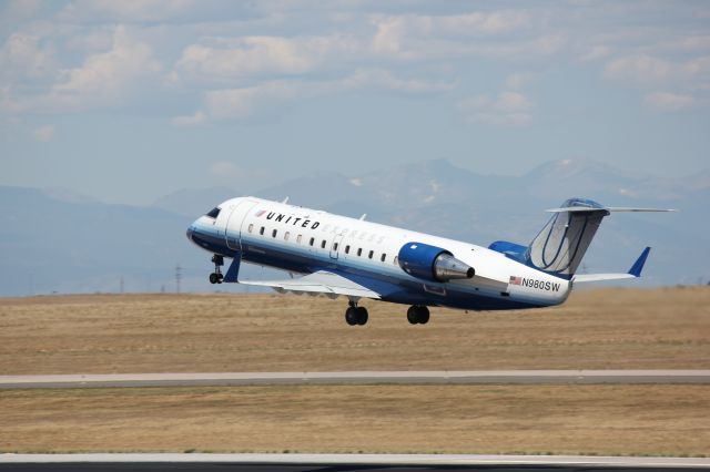 Canadair Regional Jet CRJ-200 (N980SW) - Departing on runway 25.