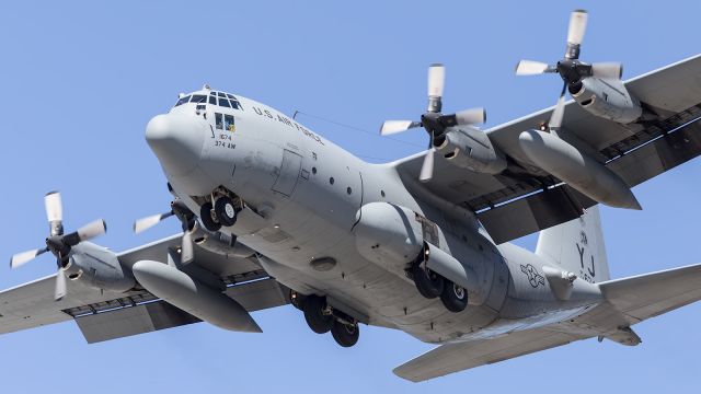 — — - USAF, C130H, on short finals to Townsville, RAAF Air Base.