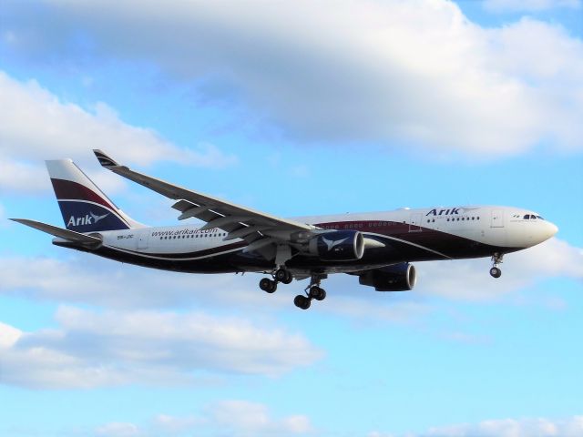 Airbus A330-200 (5N-JIC) - Arik Air (W3) 5N-JIC A330-223 [cn891]br /London Heathrow (LHR). Arik Air flight W3101 arriving from Lagos Murtala Muhammed (LOS).  br /Taken from Northern Perimeter Road (27R Approach)br /2015 08 11  a rel=nofollow href=http://alphayankee.smugmug.com/Airlines-and-Airliners-Portfolio/Airlines/MIDDLE-EAST-AFRICAhttps://alphayankee.smugmug.com/Airlines-and-Airliners-Portfolio/Airlines/MIDDLE-EAST-AFRICA/a