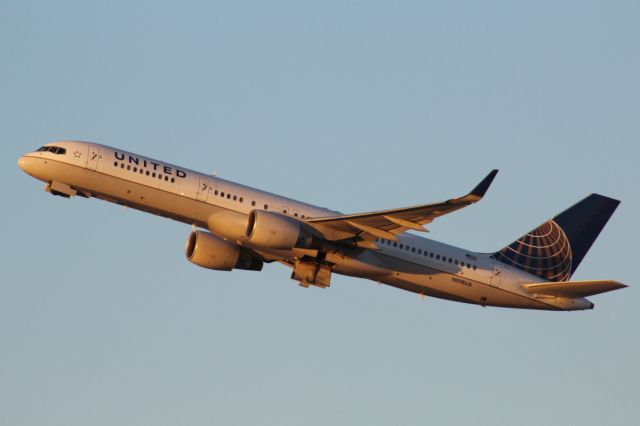 Boeing 757-200 (N598UA) - Early evening sun hitting the 757 after it took off from RW 25R