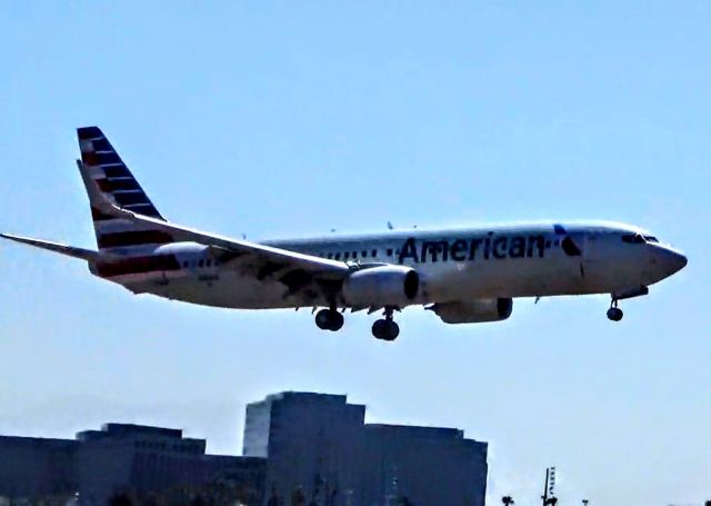 Boeing 737-800 (N301PA) - On short final for Runway 20R.