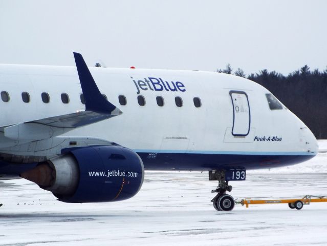 Embraer ERJ-190 (N193JB) - "Peek-A-Blue" pushing back from gate 2 in Worcester.