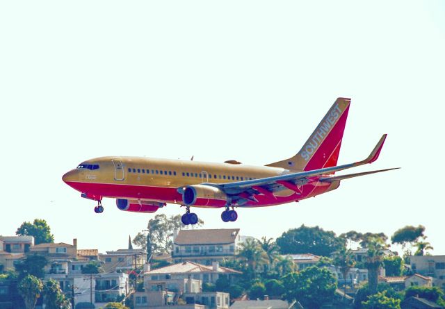 Boeing 737-700 (N714CB) - The Southwest Retro Jet landing at San Diego.