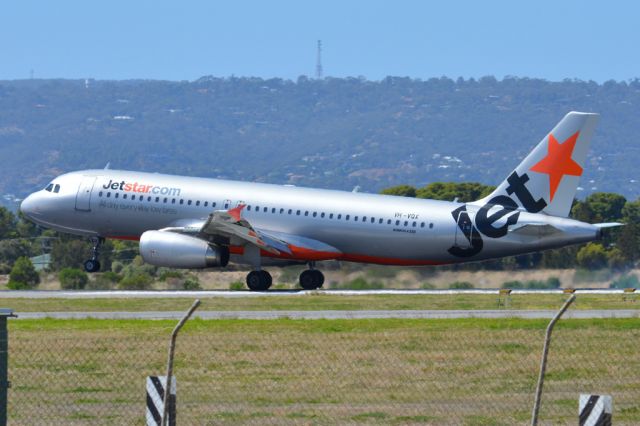 Airbus A320 (VH-VQX) - Putting down on runway 05. Thursday March 6th 2014.