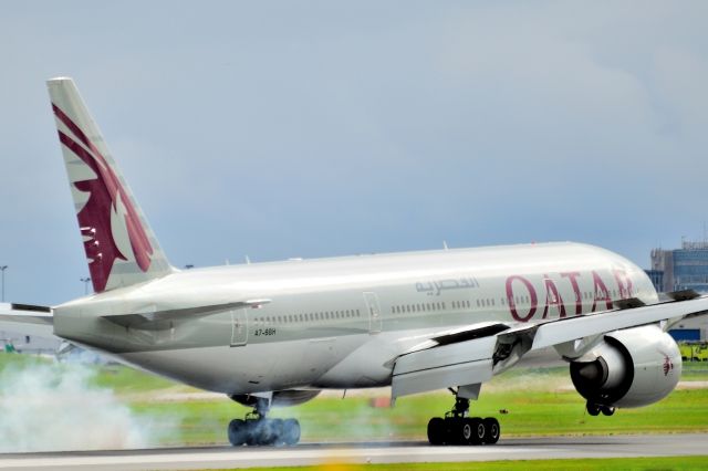 BOEING 777-200LR (A7-BBH) - Arriving from Doha.