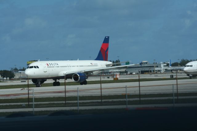 Airbus A320 (N358NW) - Taken from a car driving at 70 MPH on a highway.