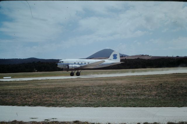 Douglas DC-3 (VH-MWQ) - Setair operated both passenger and freight flights in the 70s, VH-MWQ departing RWY23, circa 1979